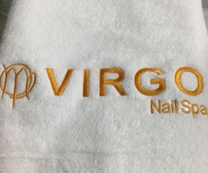 Khăn thêu logo virgo nail spa